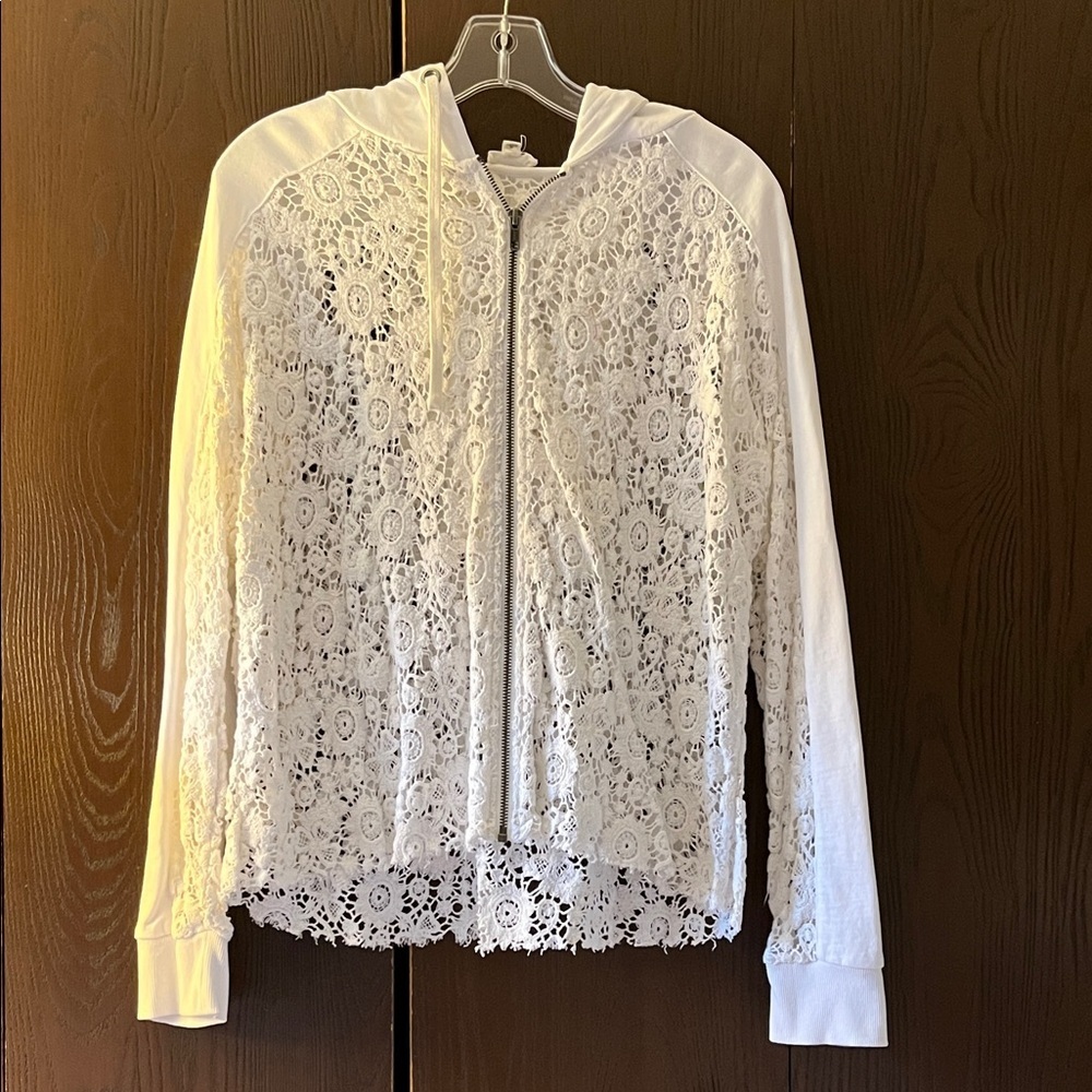 Eze Sur Mer long sleeved white crocheted jacket with hood. Size Small